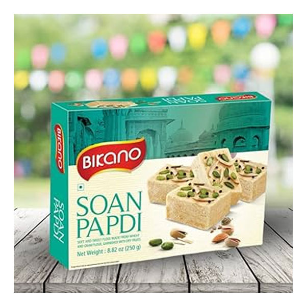 Bikano-soan-papdi-250g.jpg Bikano Soan Papdi 250g | Traditional Indian Sweet | Flaky & Melt-in-Mouth Delight - Image 1