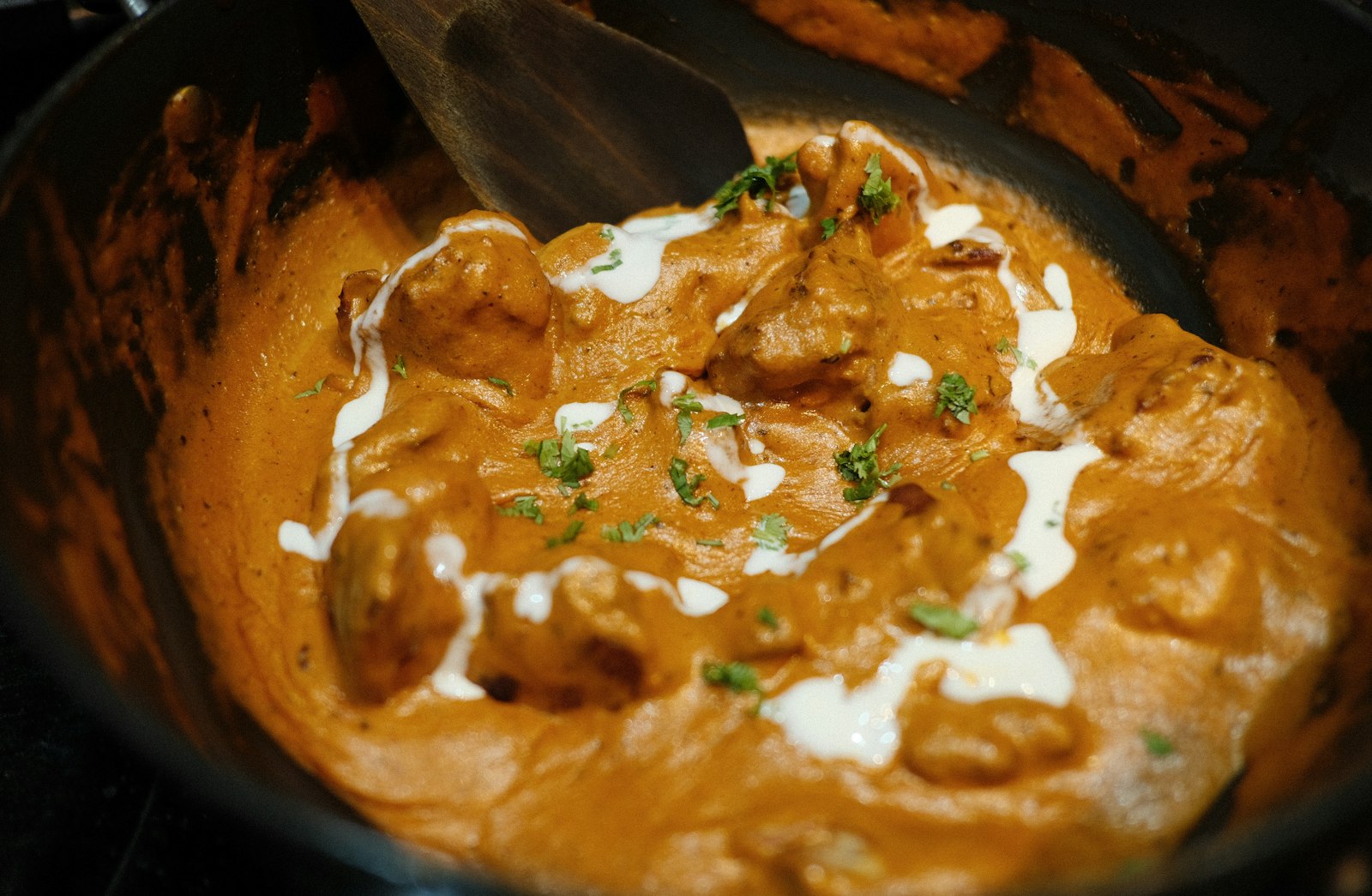 Butter Chicken in Spain - creamy murgh makhani curry served in a bowl