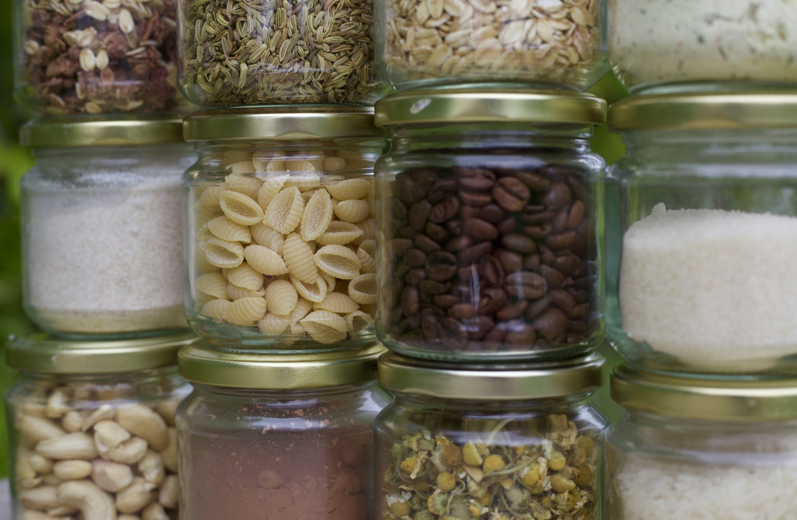 Desi Pantry Staples Spain - assorted spices stored in clear glass jars