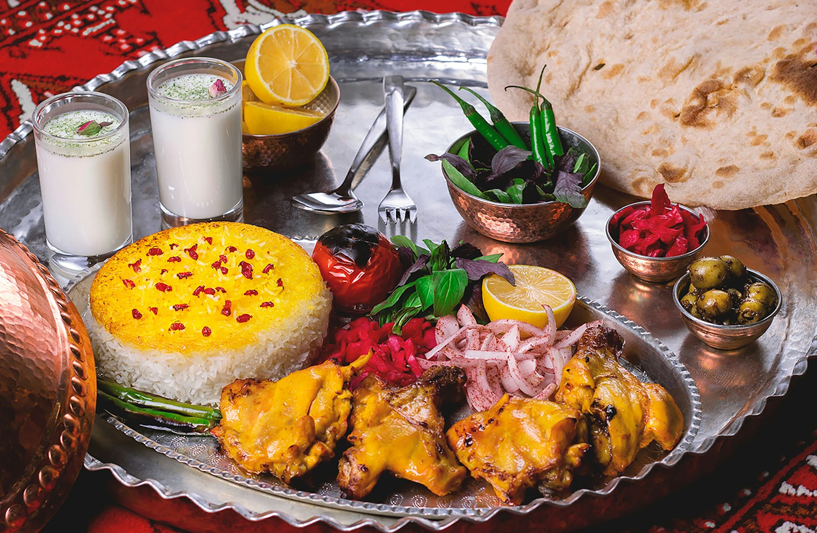 Halal Groceries in Spain - silver platter of meat and vegetables cooked with halal masala