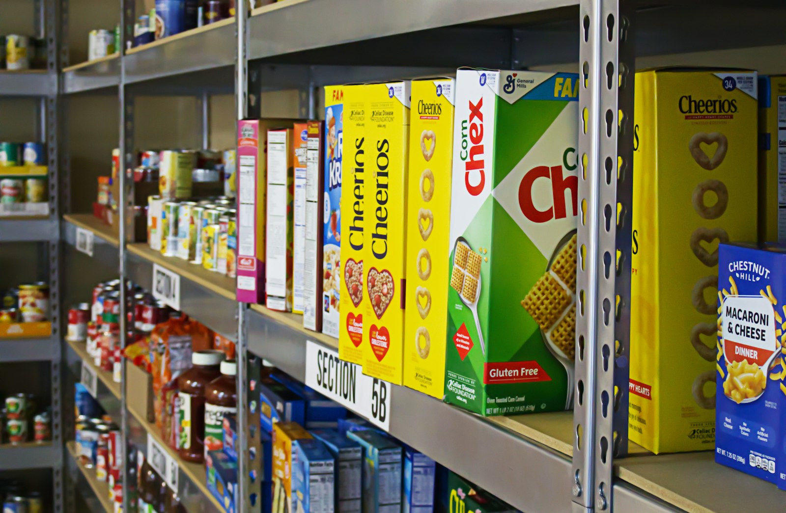 Halal Groceries in Spain - store shelf stocked with packaged foods to check for Halal labels