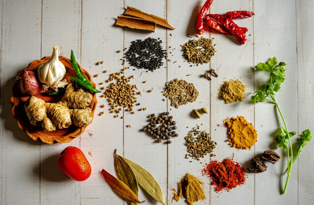 Indian Spices in Spain - variety of whole and ground masalas on a table