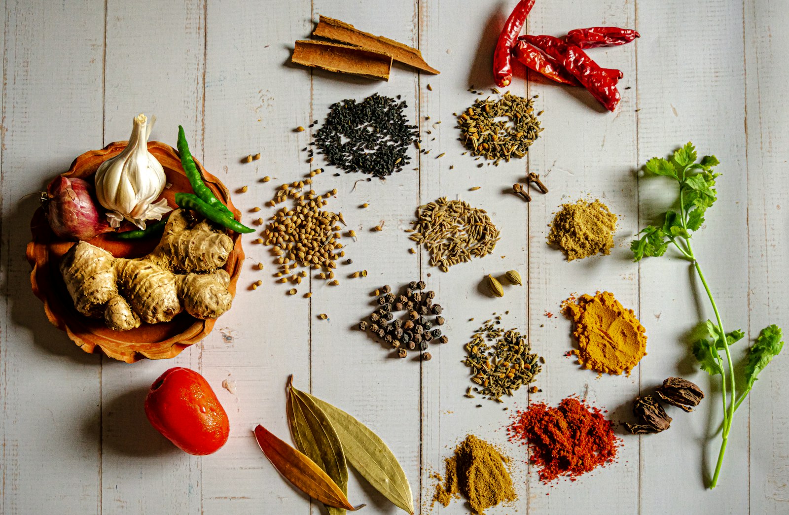 Indian Spices in Spain - variety of whole and ground masalas on a table
